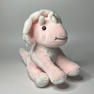 Triceratops sitzend rosa